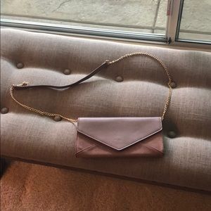 Light pink cross body clutch